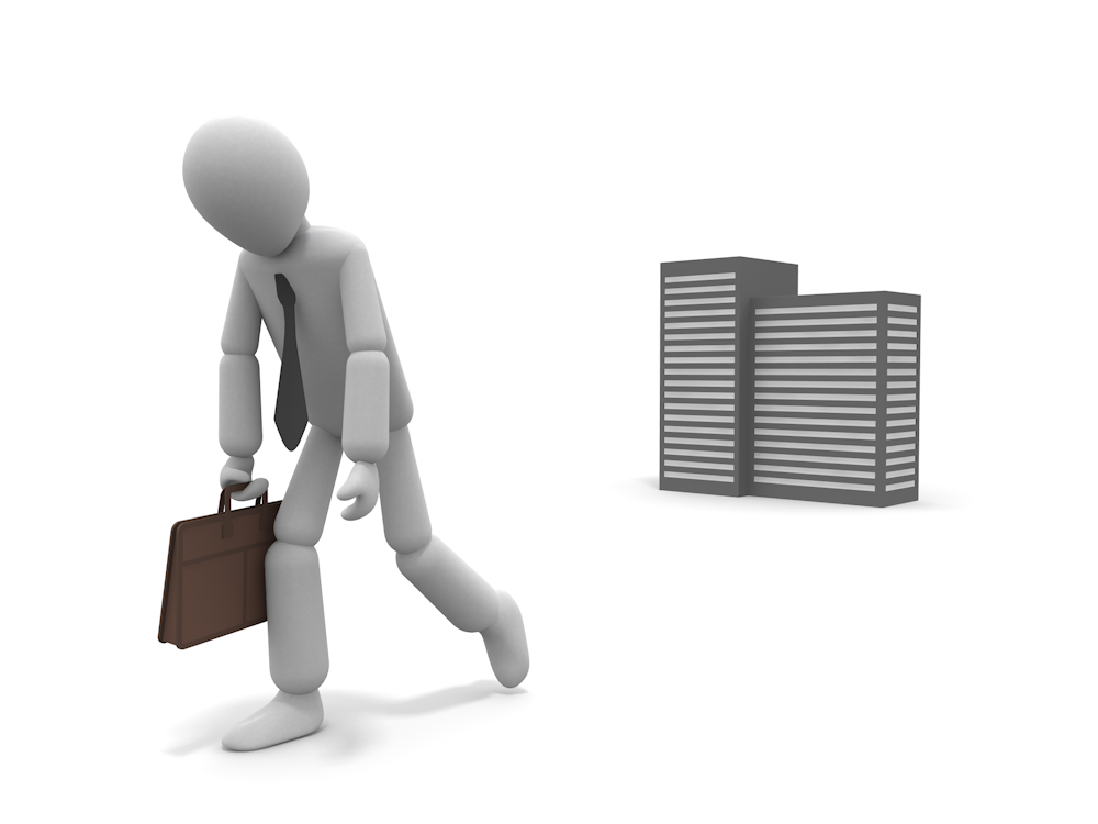 An illustration of a business person in a suit, carrying a briefcase and walking with his head down (a building in the background)