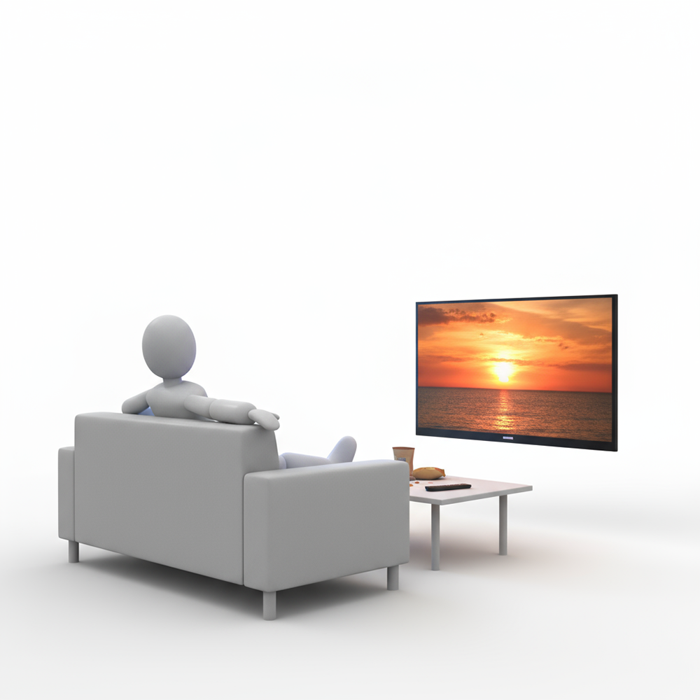 ソファに座ってテレビで夕日を見ている人物