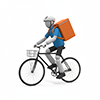 自転車に乗って配達する人物