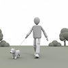 犬を連れて散歩する人物