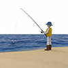 砂浜で釣りをする人物