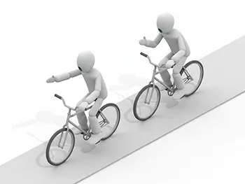 自転車で坂道を上り、一人が指差し、もう一人がサムズアップしている二人のイラスト