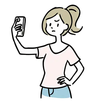 スマートフォンで自撮りをして不満そうな表情の女性の無料イラスト