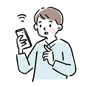 スマートフォンを見て驚いた表情の男性の無料イラスト