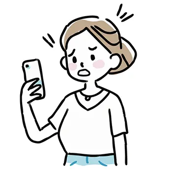 スマートフォンを見てショックを受け青ざめている女性の無料イラスト