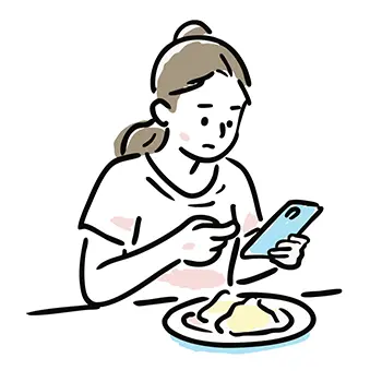 食事をしながらスマートフォンを真剣な表情で見る女性の無料イラスト