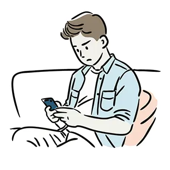 ソファに座ってスマートフォンを真剣な表情で見る男性の無料イラスト