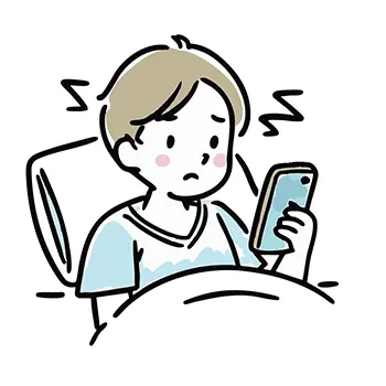 ベッドで寝ながらスマートフォンを見て不安そうな表情の男性の無料イラスト
