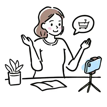 スマートフォンで撮影しながらライブコマース（商品紹介）をする女性の無料イラスト