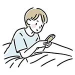 【無料イラスト】ベッドでスマホを見る男性（真剣） | 商用利用OK・フリー素材