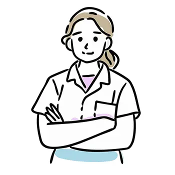 白衣(スクラブ)を着用した女性看護師(または介護士)が、腕組みをして自信のある笑顔で立っているフリーイラスト。