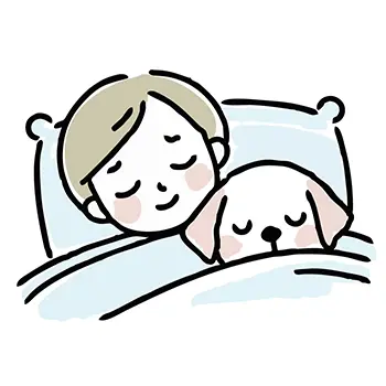 男の子と子犬が一緒にベッドで寝ている無料イラスト