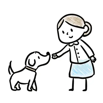 犬におやつを手からあげている女性の無料イラスト