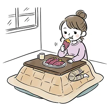 冬の日、こたつに入って美味しそうに焼き芋を食べている女性の無料イラスト。