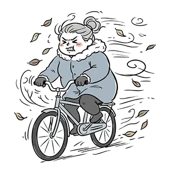  秋・冬の強風（木枯らし）の中、おばあさん（シニア女性）が必死の表情で自転車をこいでいるイラスト。