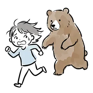 背後から迫る大きな熊に怯え、必死の形相で走って逃げている子供