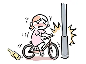 顔を赤くして酒に酔った女性が自転車を運転し、電柱にぶつかっているイラスト。傍らには酒瓶が転がっている。