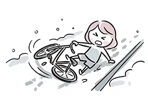 雪が積もり凍結した道路で、自転車のタイヤが滑って激しく転倒し、痛がっている女の子のイラスト