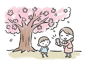 桜の木の下で男の子をスマホで撮影する母親のイラスト