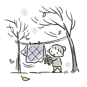 寒い風が吹く中で洗濯や薪運びをして冬の準備をする女性のイラスト