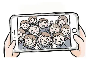 卒業式にスマートフォンで涙を流しながら笑顔で自撮りをする男女の学生たち