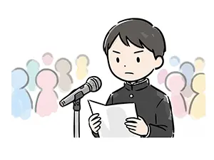 マイクの前に立ち真剣な表情で卒業式の答辞の原稿を読む学ラン姿の男子生徒