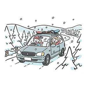 スノーボードを積んだ車で雪道をドライブする家族