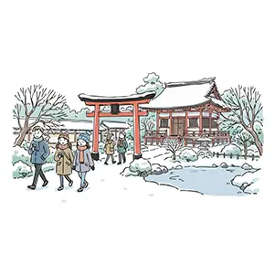 雪景色の中にある神社の境内を歩く参拝客たち